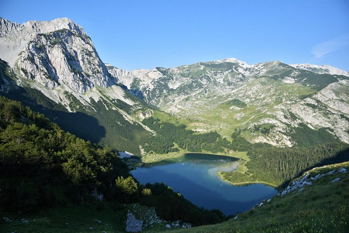 Hearth shaped lake beneath Maglic